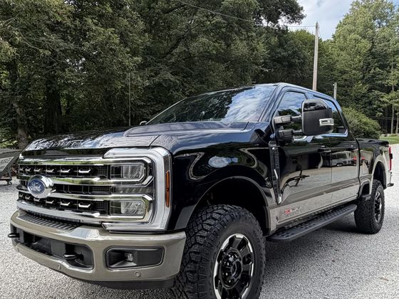 black Ford F-250 Tremor gleaming after a full auto detail