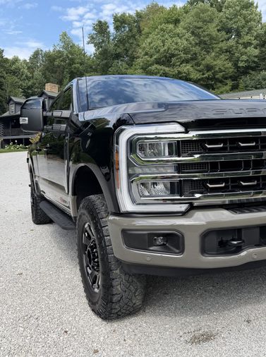 detailed Ford F-250 grille and headlight