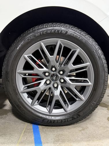 detailed Ford wheel and tire