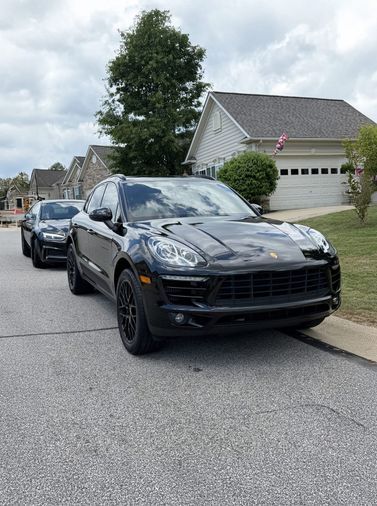 black Porsche Macan front after a mobile detail