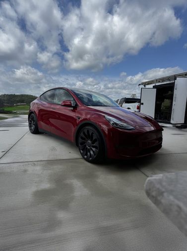 red Tesla Model Y mobile detail